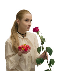 beauty Girl with gifts and red rose on white. Isolated