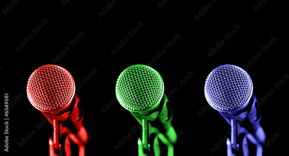 Microphone Input Color primary colored microphones on black Stock Photo | Adobe Stock