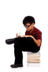 Poster - student reading book