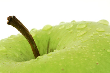 Green apple with droplets