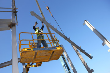 Steel Worker on cherry picker