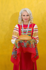 Wall Mural - Russian woman in a folk russian dress