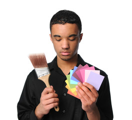 Wall Mural - Young Man With Paintbrush and Swatches