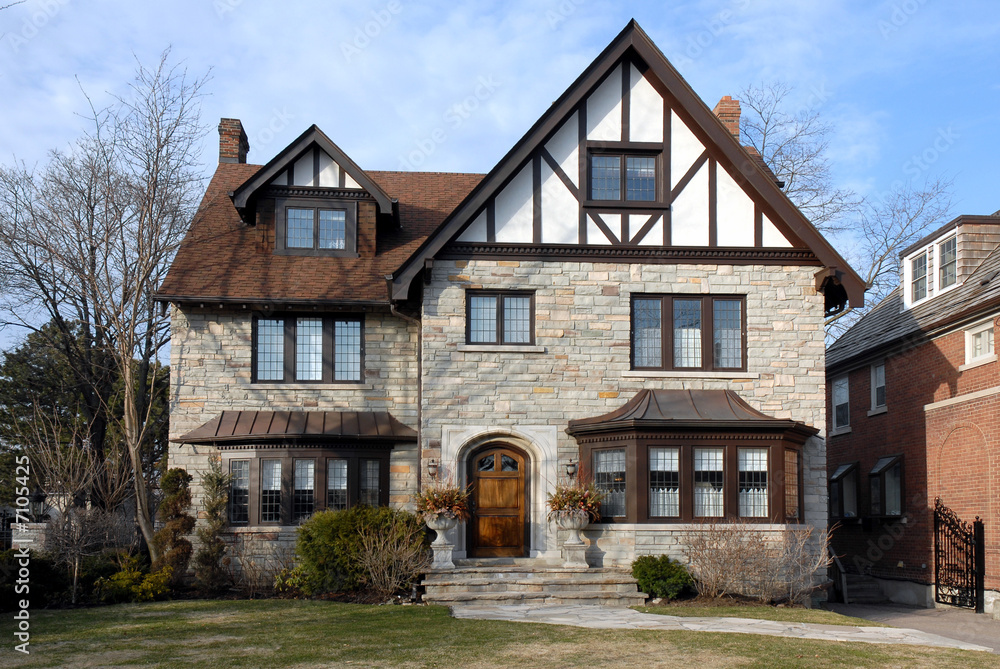 Large tudor style house with bay window