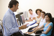 © Monkey Business - Manager briefing office staff