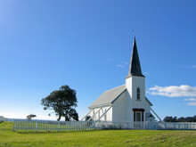 Small White Wooden Protestant Church With A Blue Sky