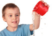 © Pavel Losevsky - boy  pours out water from red plastic cup