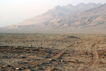 Wall Mural - Old road in desert, West China