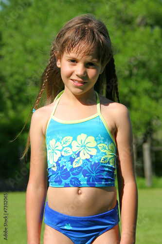 little girl wearing swimsuit