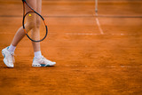 Fototapeta Sport - Clay tennis court and player concept