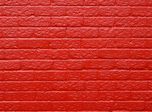 Red Painted Brick Wall Background.