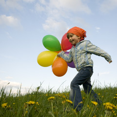 Wall Mural - Little girl with baloons