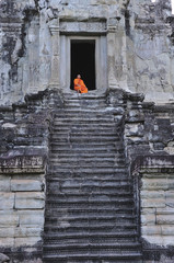 Wall Mural - Cambodia Angkor Wat with a monk
