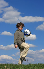 Wall Mural - Boy playing ball