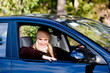 © EastWest Imaging - Woman In Car