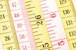 White & Yellow Measuring Tapes with metric & imperial divisions