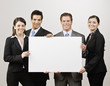 © AVAVA - Business people holding blank poster board