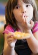 © BCFC - Adorable young child eating a snack
