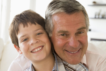 Wall Mural - Grandfather and grandson smiling