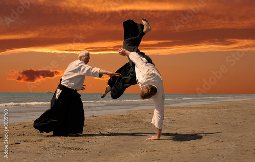 Board z aluminiowym obramowaniem Aikido o zachodzie słońca