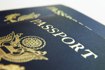 Closeup if American passports, on light background