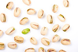 Fototapeta Lawenda - Pistachio nuts and one naked core isolated on white