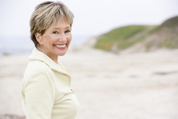 Woman at the beach smiling