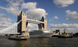 Cruise ship leaving london under tower bridge
