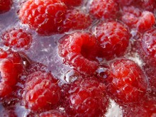 Ripe Raspberries In Water