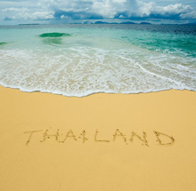 Thailand Written In A Sandy Tropical Beach