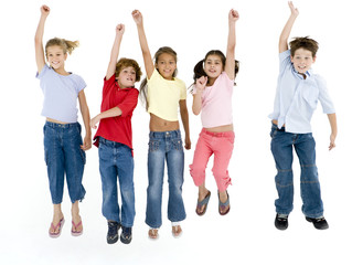 Five friends jumping and smiling