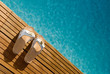 Wooden sandals and swimming pool