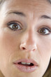 © Monkey Business - Head shot of surprised woman