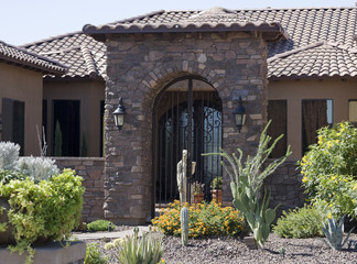 Arched stone with iron gate