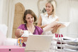 © Monkey Business - Two women and a baby in home office with laptop