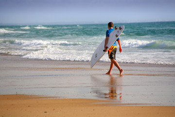 Wall Mural - Surfer on the beach