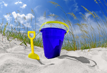 Wall Mural - Beach bucket on sand dune