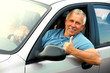 © grinny - Smiling happy elderly man  in the new car.