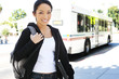 © Stephen Coburn - A cute young asian teenager getting off the bus