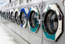 A Row Of Laundromat Washing Machines