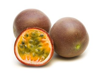 Wall Mural - fresh passionfruits on white background