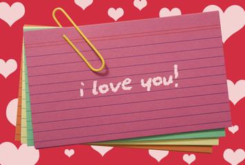 Poster - Colorful lined papers attached with yelllow clip