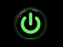 Green Power Button Isolated On Black Background