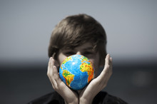 Earth Globe In Hands Protected. Earth Protection Concept