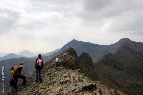 Climbers On Crib Goch Facing Towards Mount Snowdon Buy This