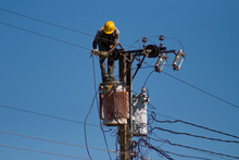 Electrician Stays On The Tower Pole And Repairs Power Line. #2