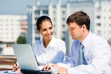 Wall Mural - Portrait of two business partners working outside