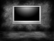 Silver Plasma Television Hanging on an Interior Wall