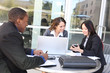 © Stephen Coburn - A diverse business team meeting as a group at office