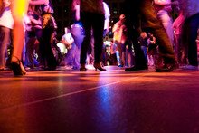 A Low Shot Of The Dance Floor With People Dancing